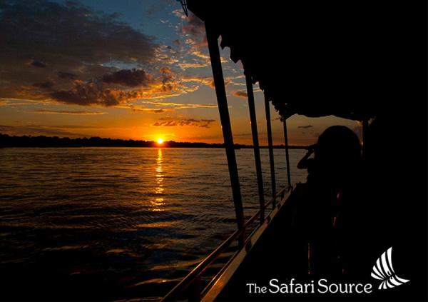 African Sunset on a Sunset Cruise with Sundowner, Zambezi River, Zambia